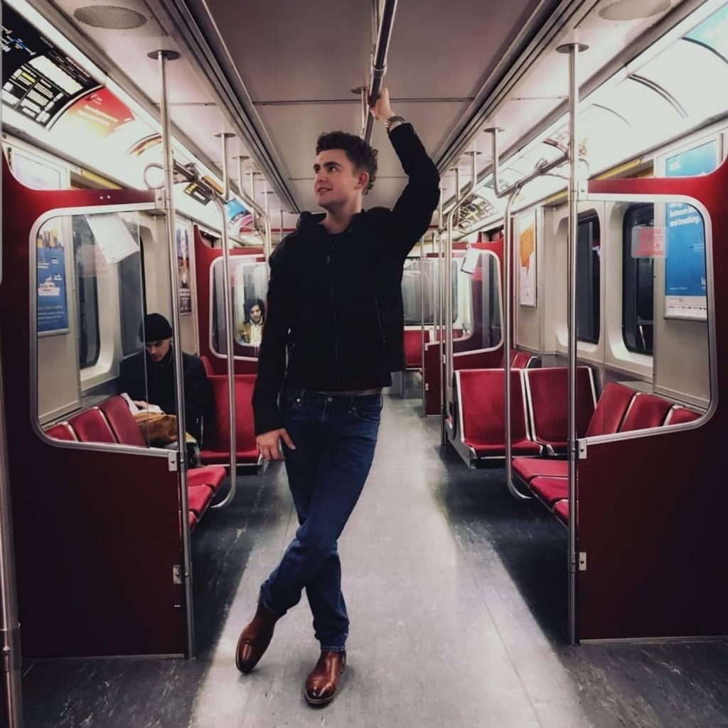 Picture of man on subway in Toronto. Andrew in TTC